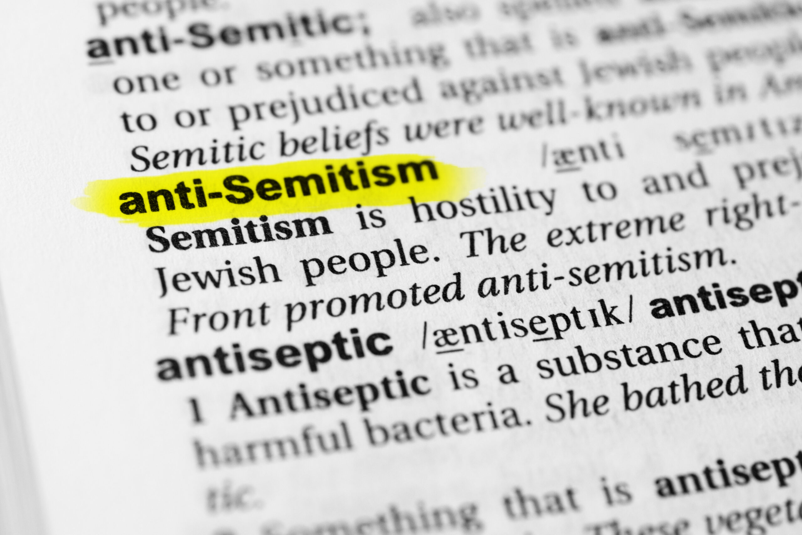 English word highlighted "anti-Semitism" and its definition in the dictionary